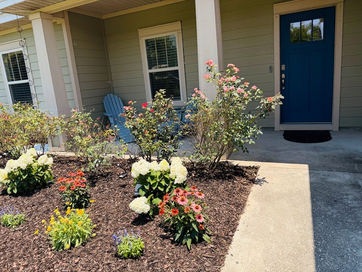 Front porch with flower beds