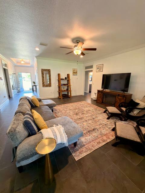 Living room with sectional sofa and TV