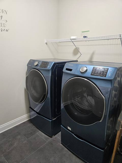 Laundry room with washer and dryer